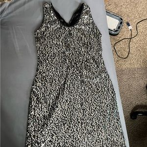 Sequin dress, hugs body